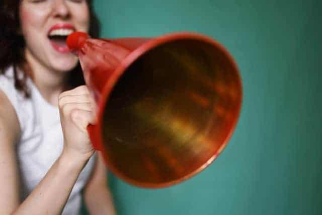 The 60 Most Downloaded Images in 2018 from Top Stock Photo Agencies Compared Young Woman Megaphone